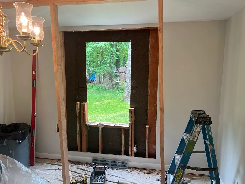 Re framing this wall to make the window bigger